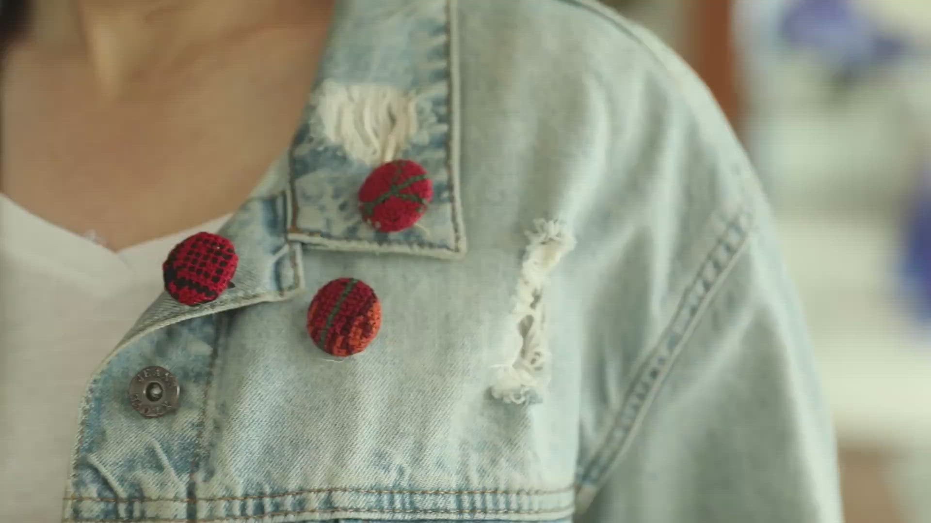 Three Embroidered Buttons